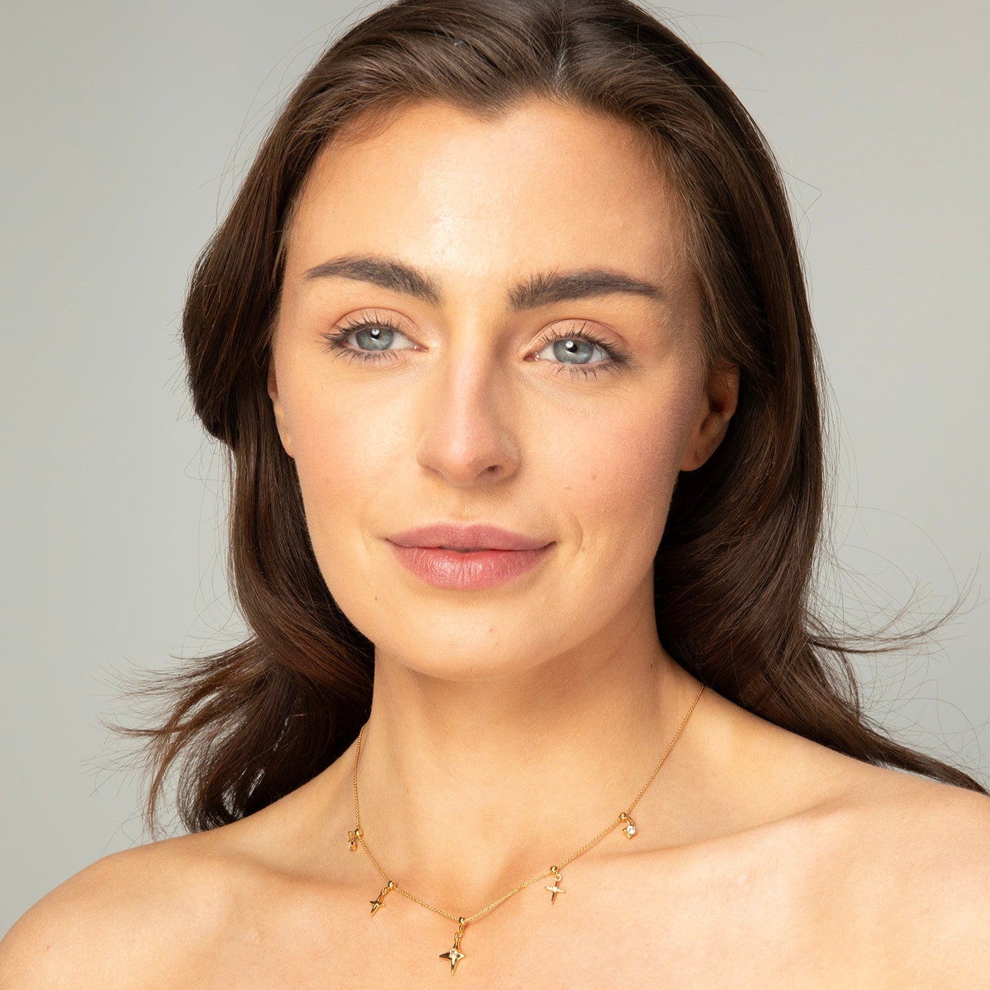 Gold Star Charm Necklace with Crystal Accents
