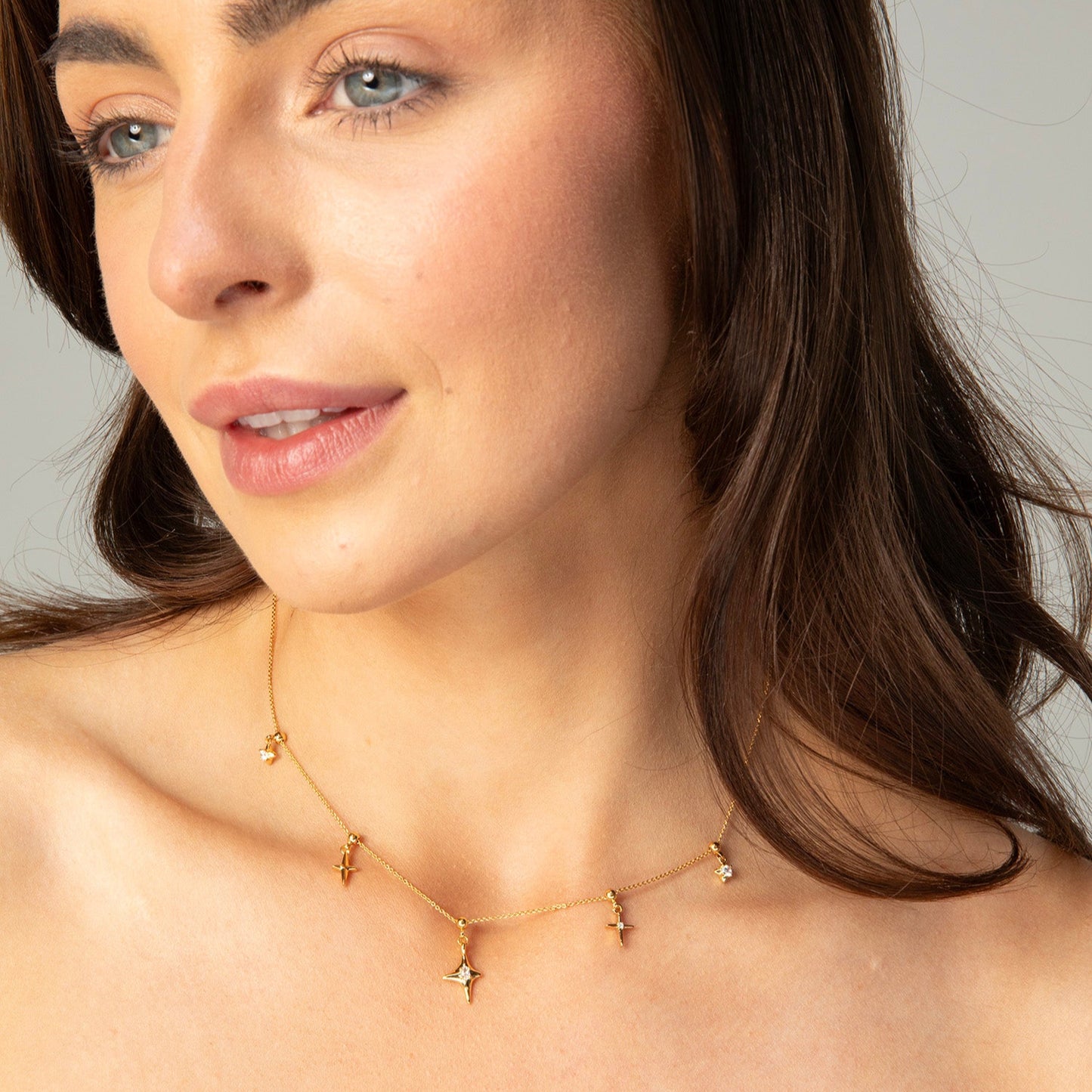 Gold Star Charm Necklace with Crystal Accents