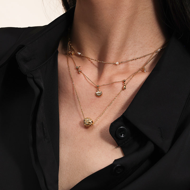 Gold Charm Necklace with Shell