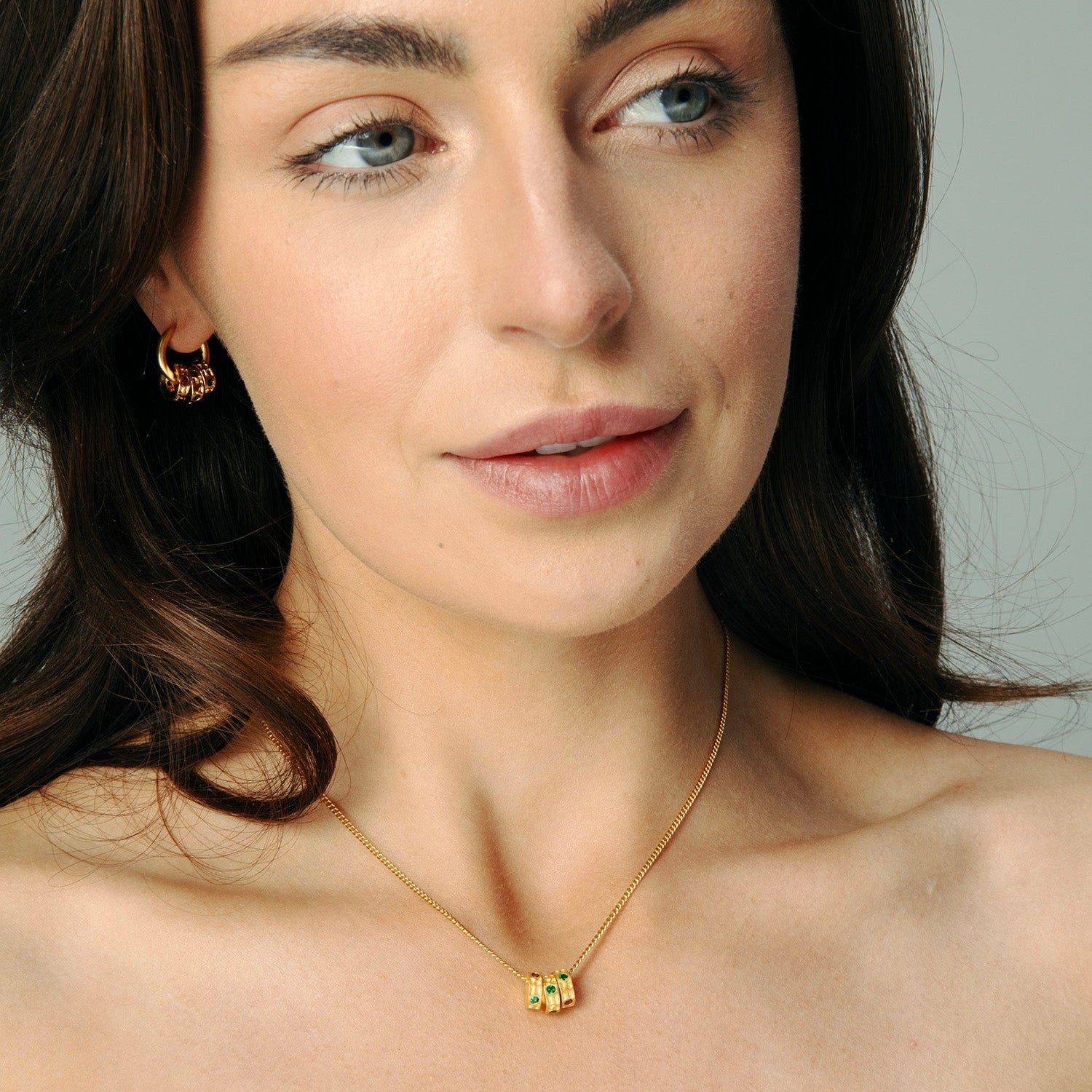 Gold Gemstone Ring Pendant