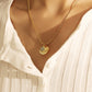 Golden Seashell Pendant Necklace with Pearl Accent - Elegant Coastal Charm