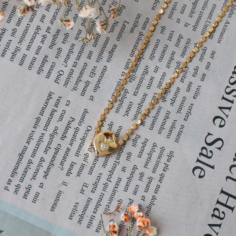 Golden Heart Encased Gemstone Necklace